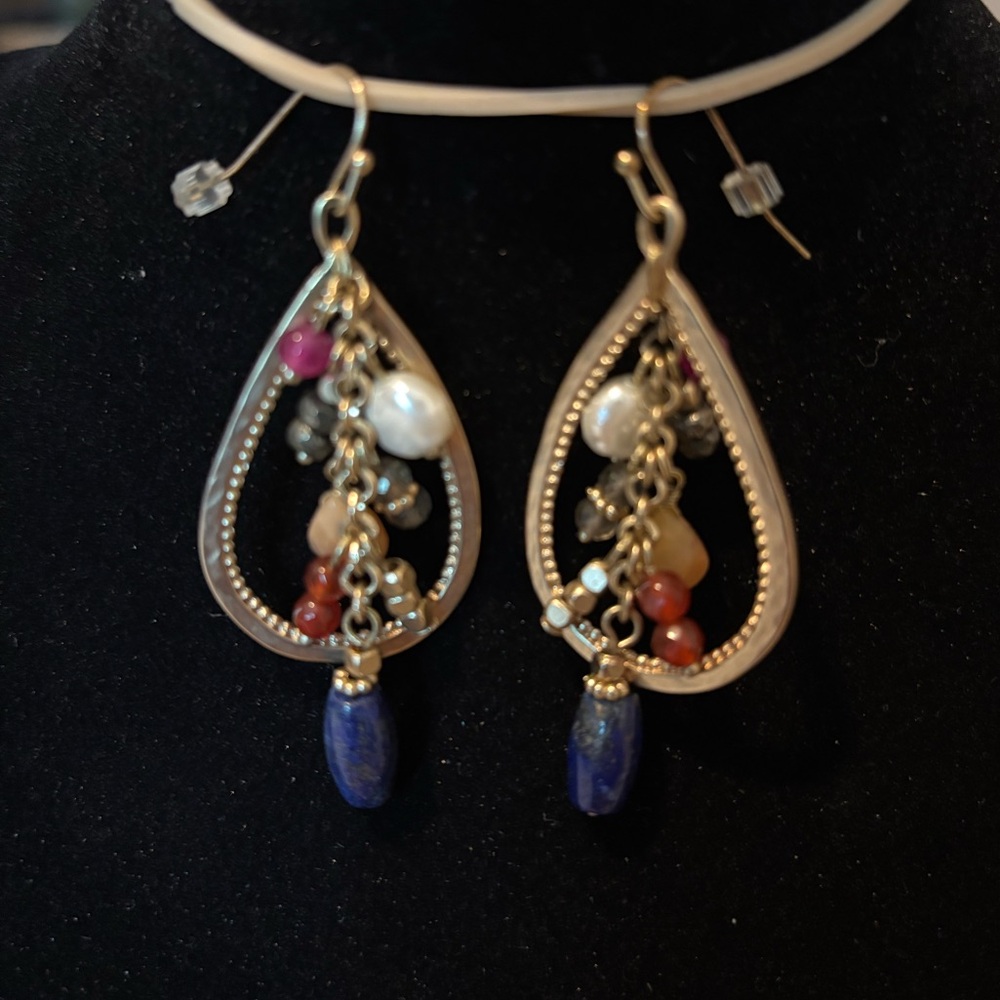 Fun and colorful dangle earrings. Multi color for versatility. Hook back.